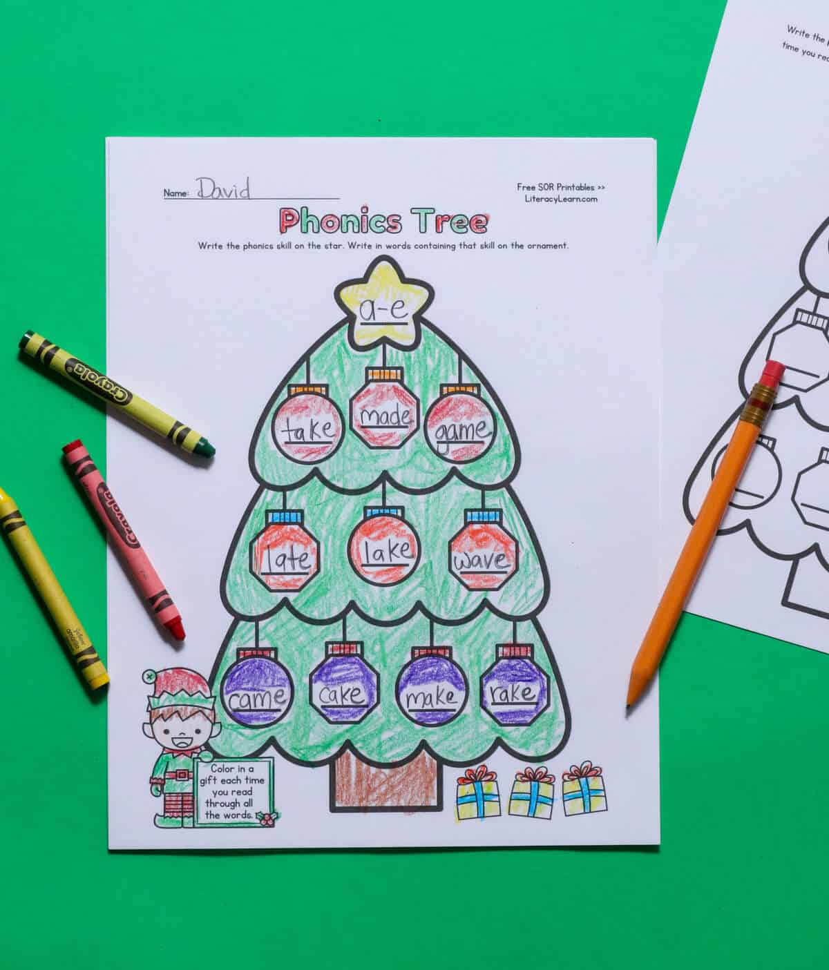 christmas tree phonics worksheet - free printable! - literacy learn